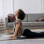 side view of woman doing yoga