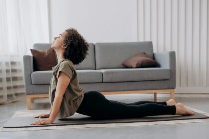 side view of woman doing yoga