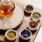 assorted herbs on bowls